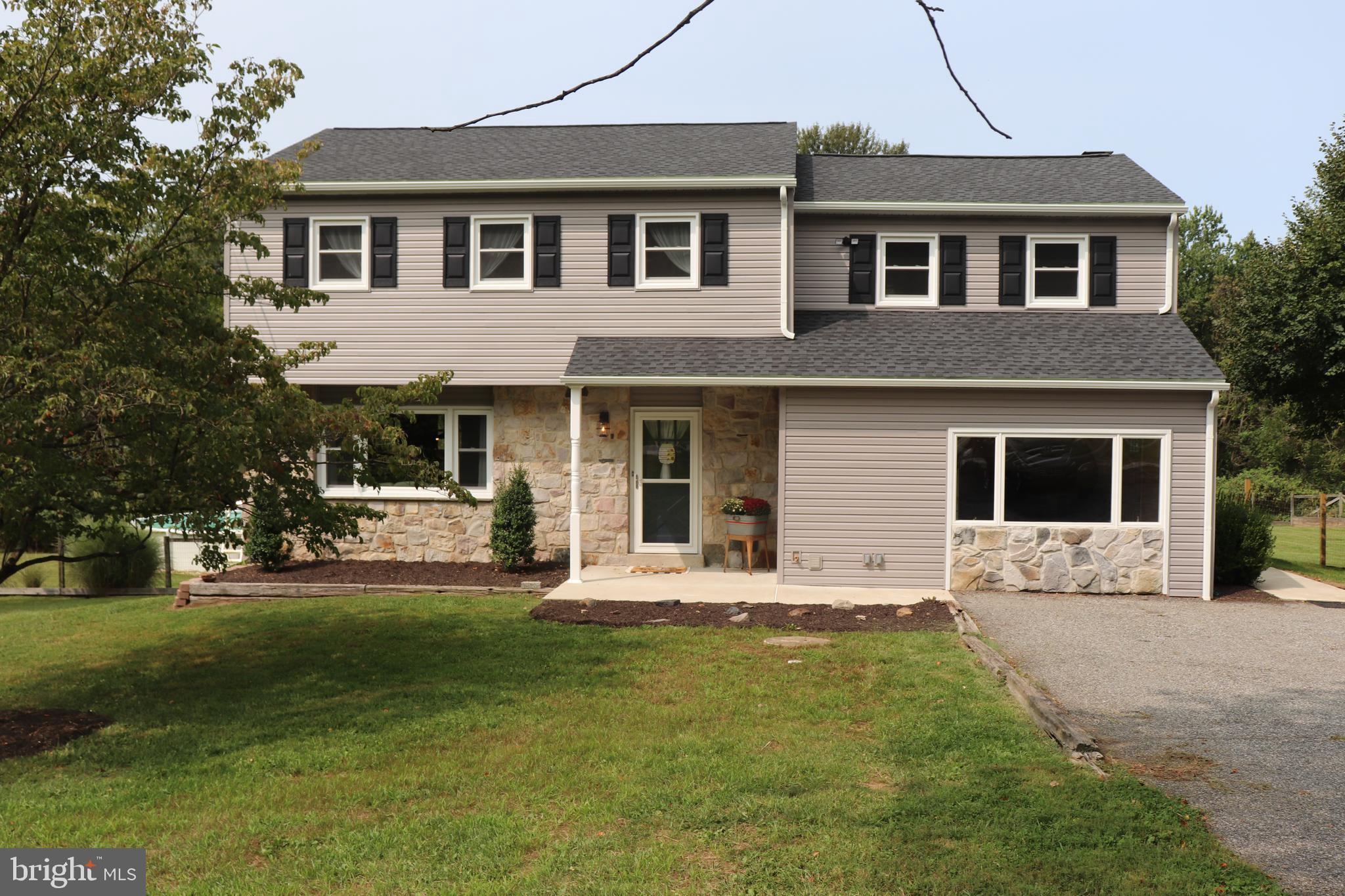 2181 School Road Pottstown, PA 19465 - Photo 1 of 42 a front view of a house with a yard