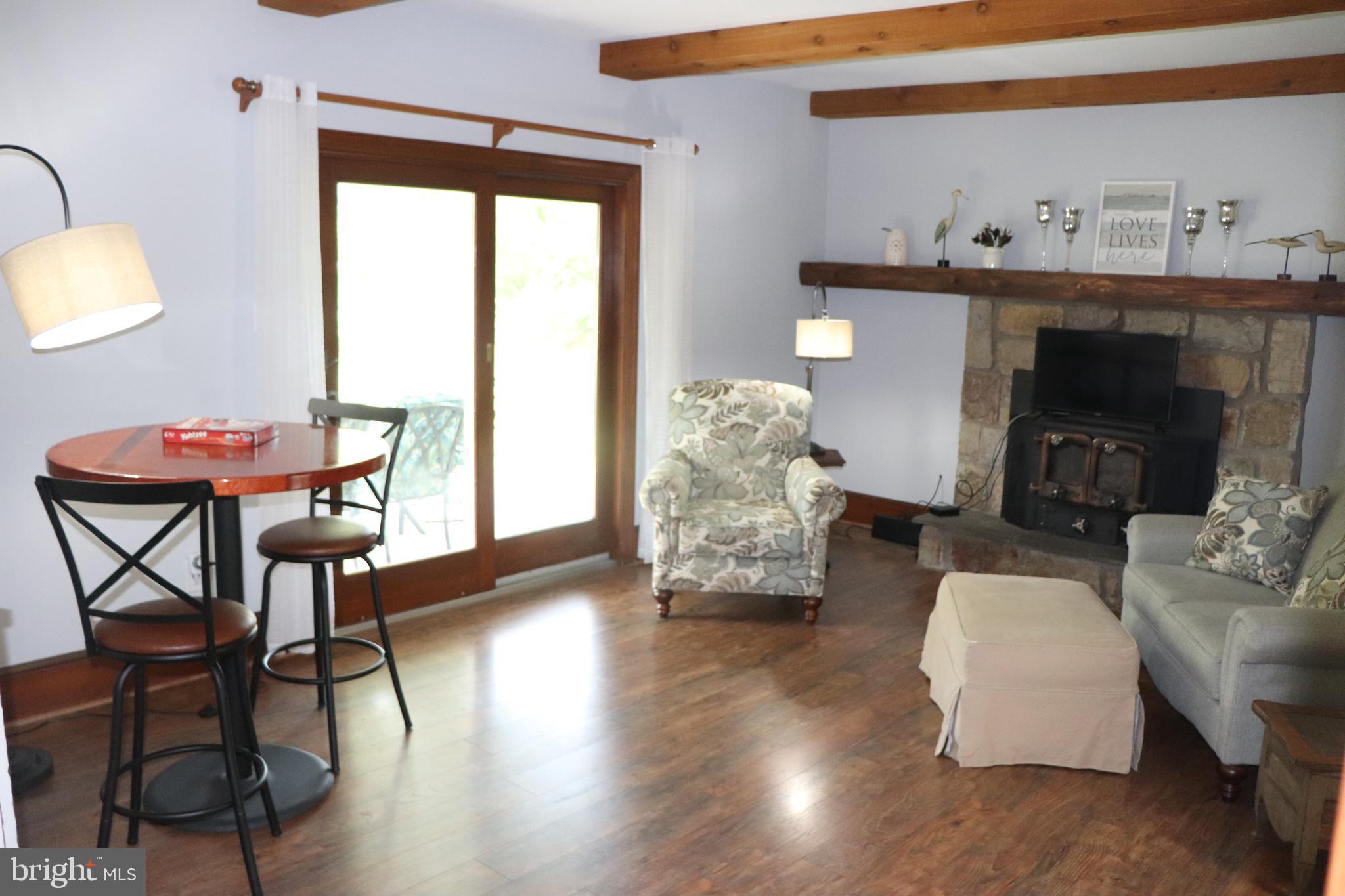 2181 School Road Pottstown, PA 19465 - Photo 13 of 42 a living room with furniture and wooden floor