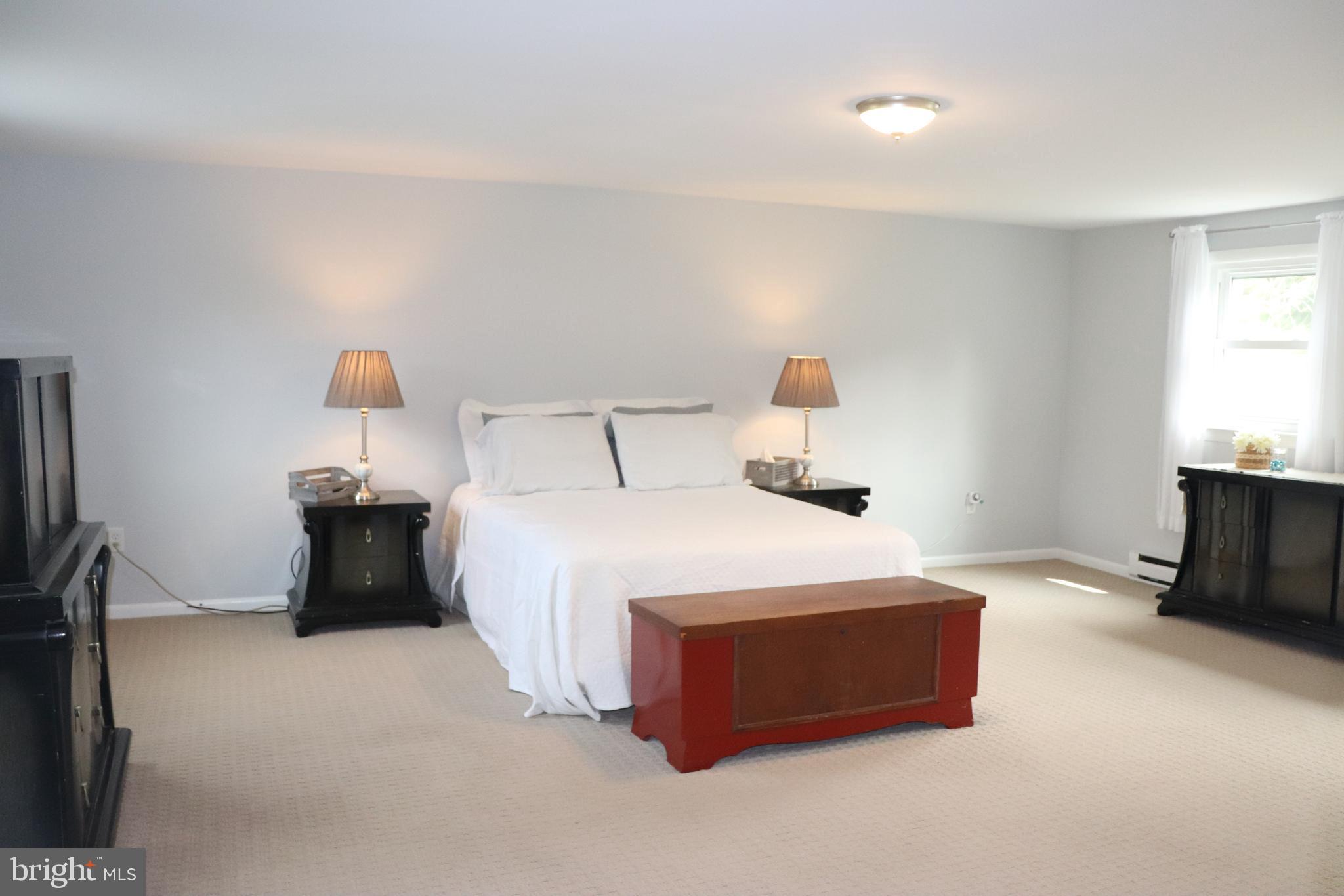 2181 School Road Pottstown, PA 19465 - Photo 20 of 42 a bedroom with a bed and a tv
