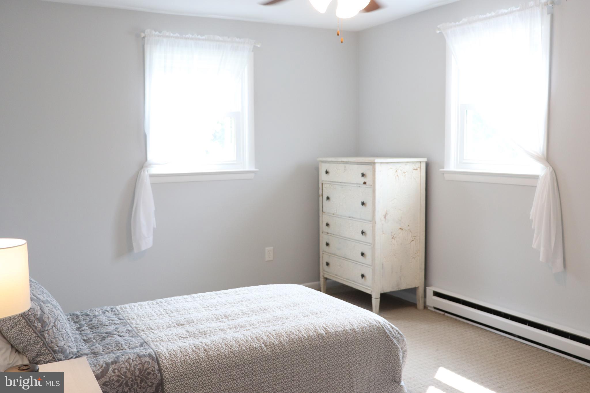 2181 School Road Pottstown, PA 19465 - Photo 26 of 42 a bedroom with a bed and a window