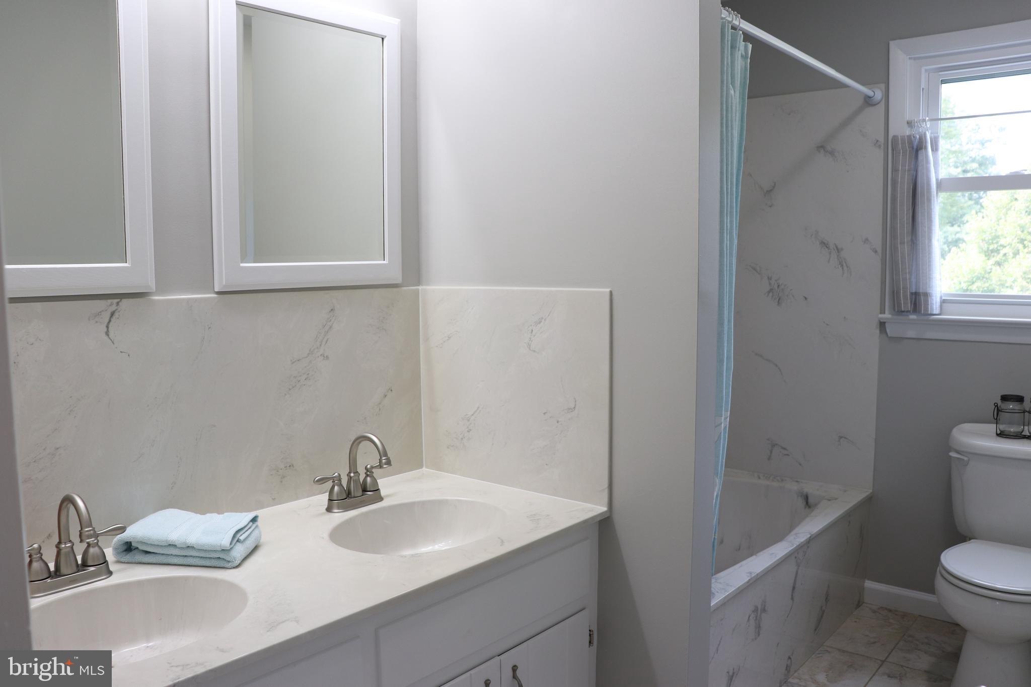 2181 School Road Pottstown, PA 19465 - Photo 27 of 42 a bathroom with a sink and a toilet