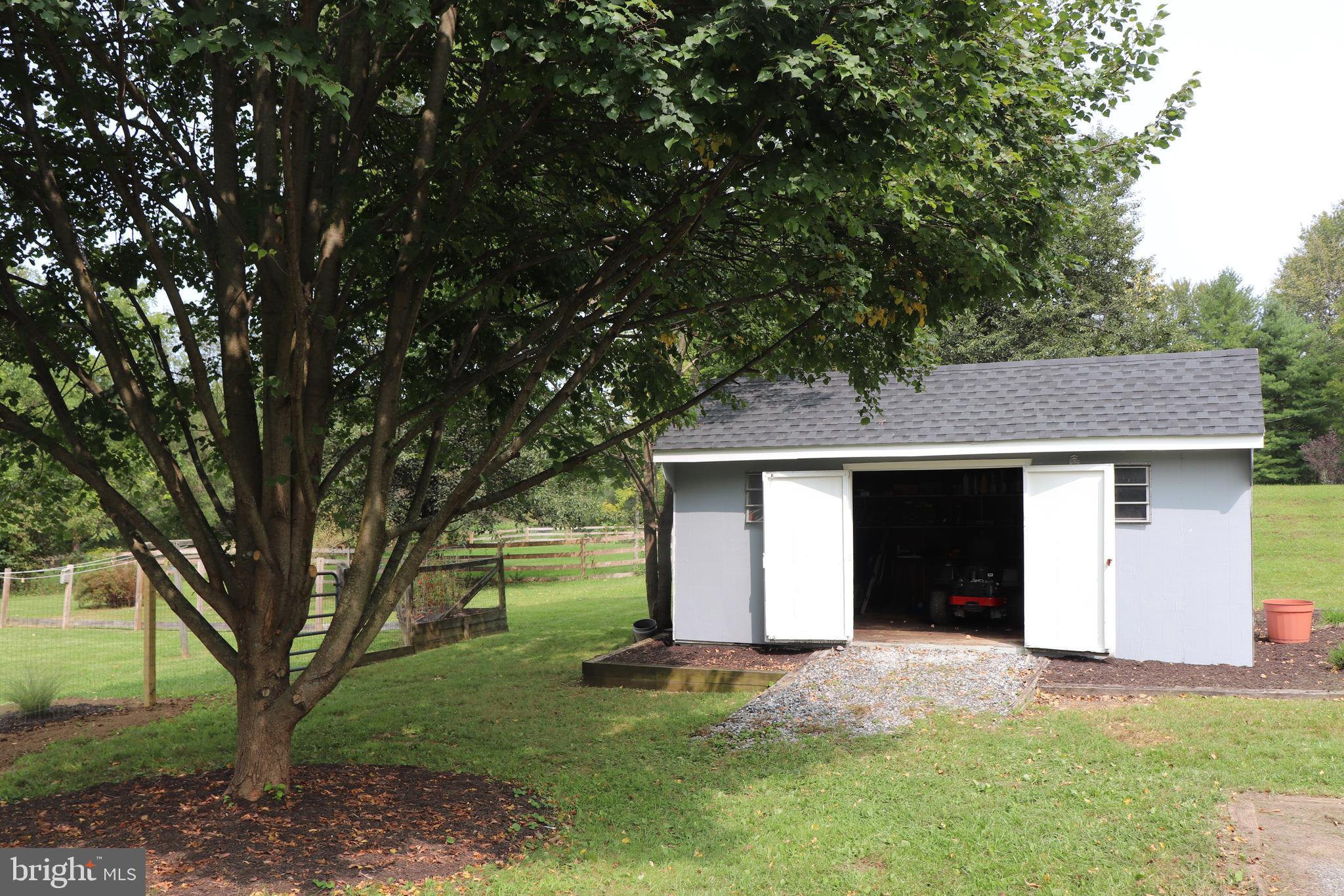 2181 School Road Pottstown, PA 19465 - Photo 41 of 42 a front view of house with yard and trees