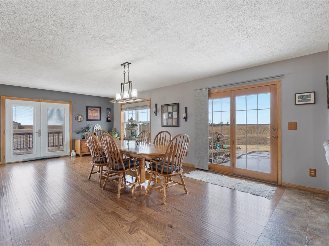 2572 160th Avenue Aledo, IL 61231 - Photo 24 of 66 a view of a dining room with furniture window and wooden floor
