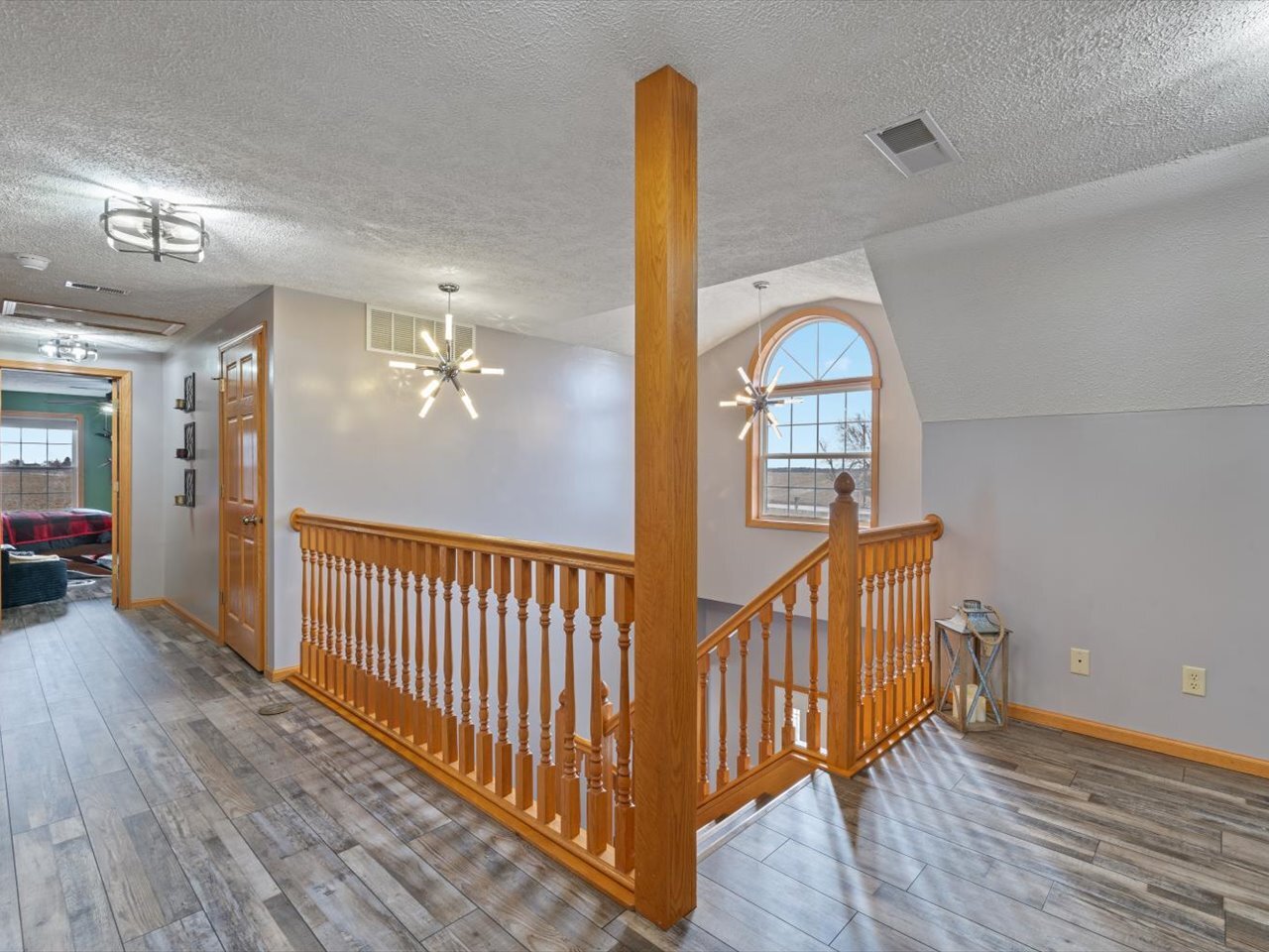 2572 160th Avenue Aledo, IL 61231 - Photo 38 of 66 a view of a hallway view with wooden floor and staircase