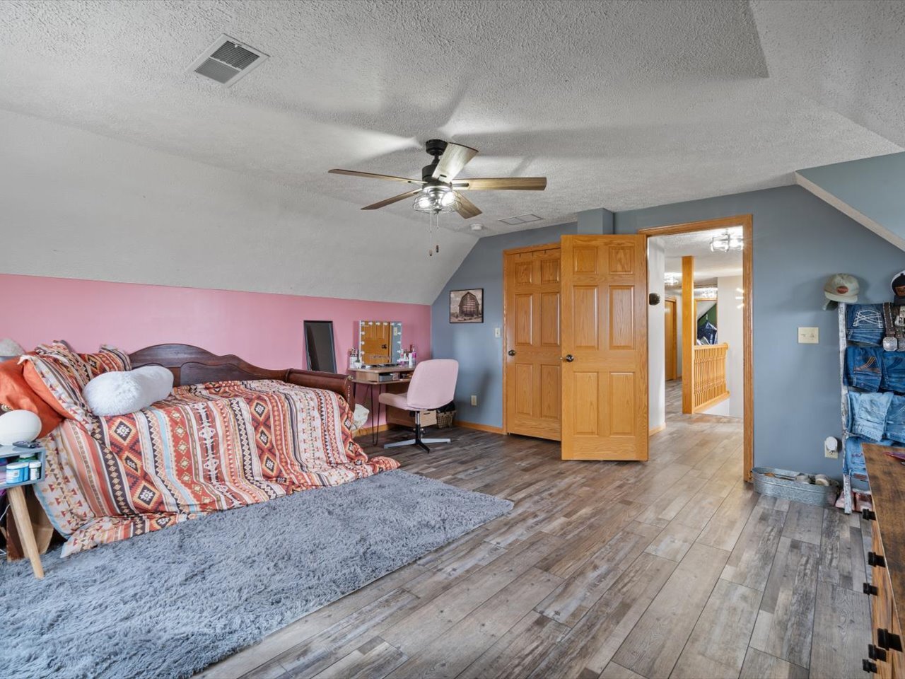 2572 160th Avenue Aledo, IL 61231 - Photo 42 of 66 a living room with furniture and a chandelier
