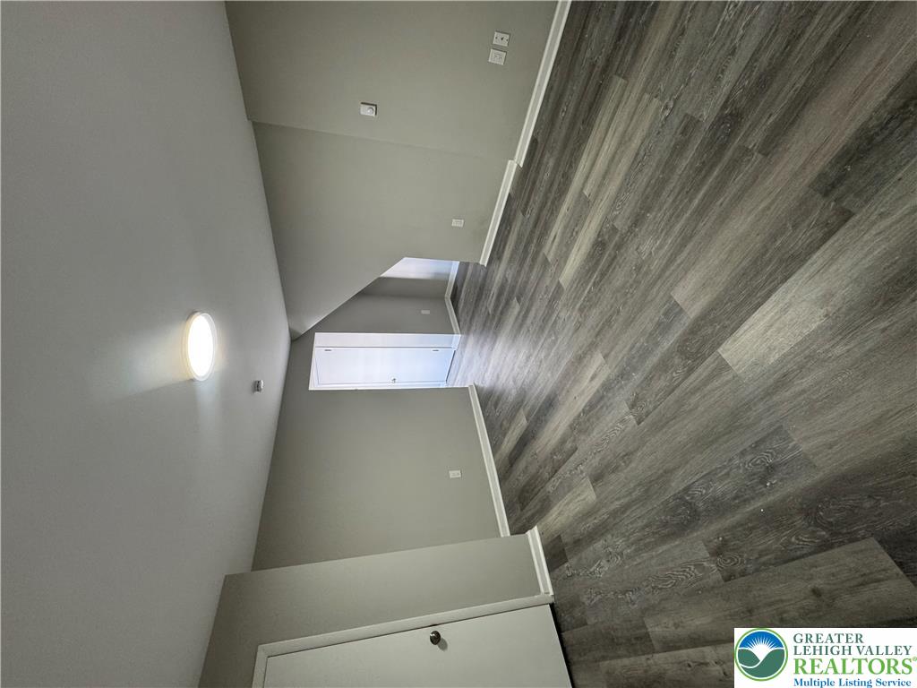 702 Walnut Street, Unit 2 Freeland, PA 18224 - Photo 3 of 8 Clean lines and durable flooring define this well-maintained interior space.