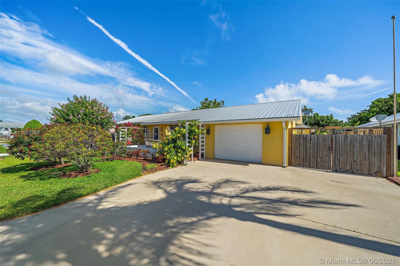 a house with yard in front of it