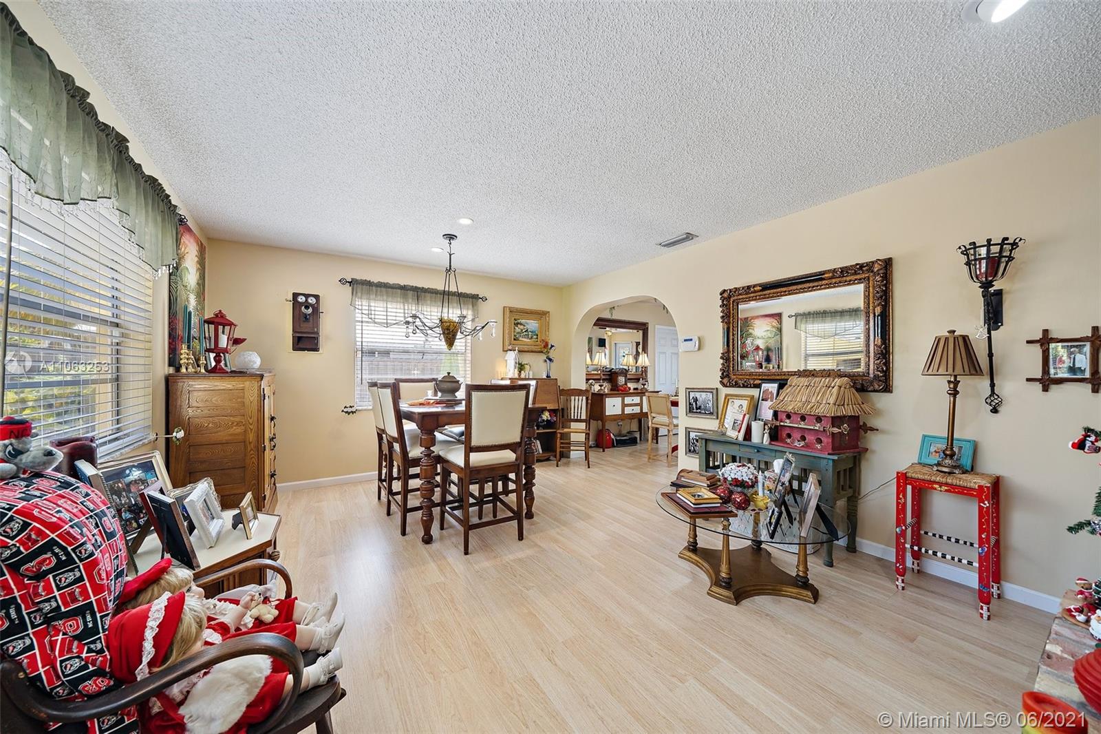 19 Shay Place Tequesta, FL 33469 - Photo 17 of 54 a living room with furniture and wooden floor