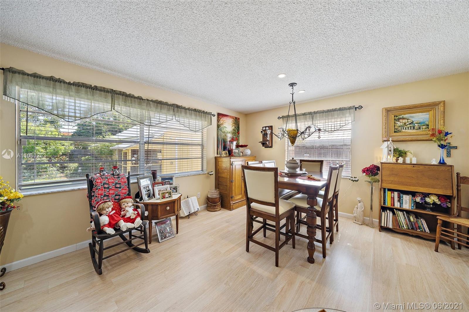 19 Shay Place Tequesta, FL 33469 - Photo 18 of 54 a view of a a dining room with furniture window and outside view