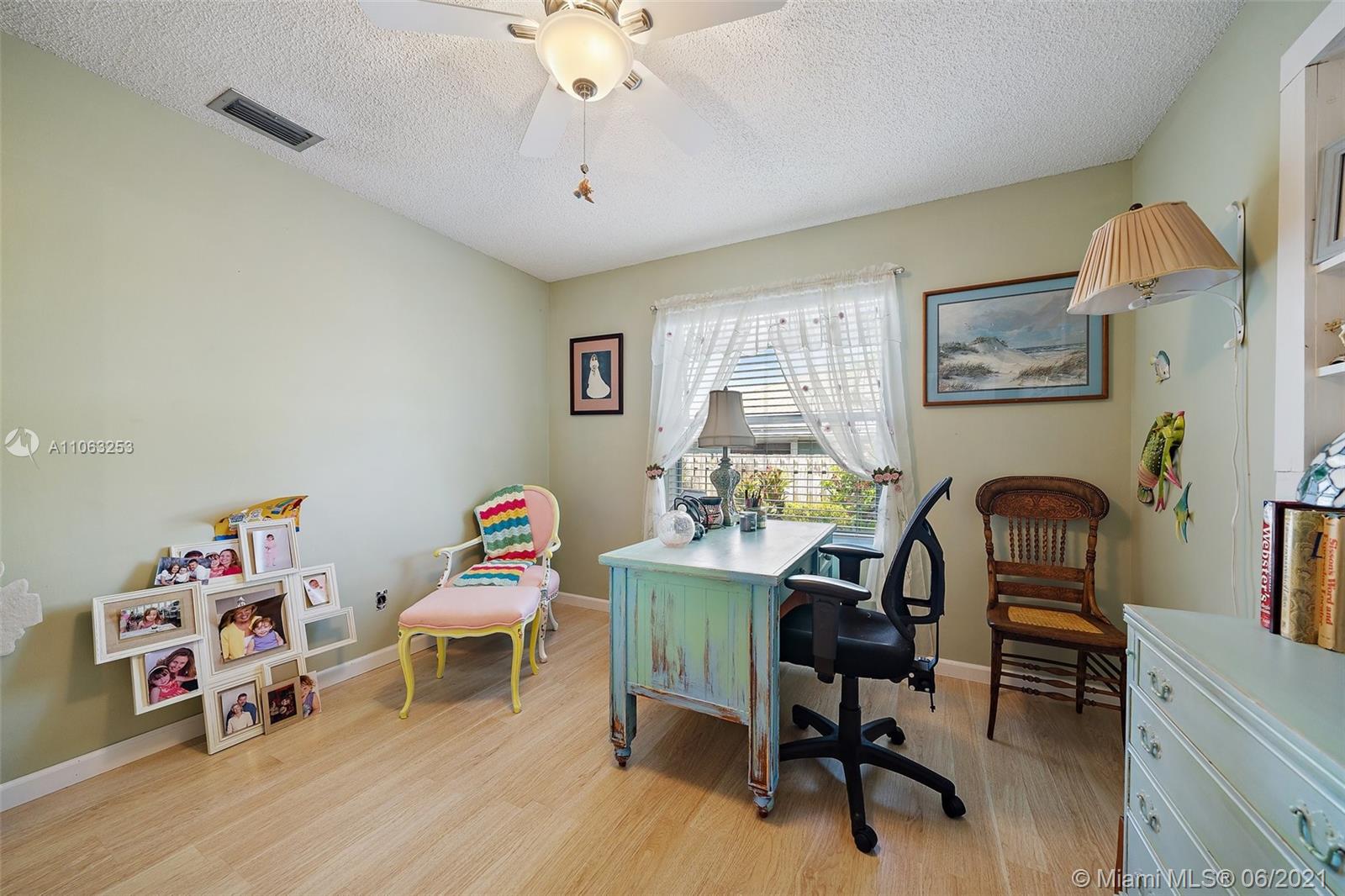 19 Shay Place Tequesta, FL 33469 - Photo 28 of 54 a workspace with furniture window and wooden floor