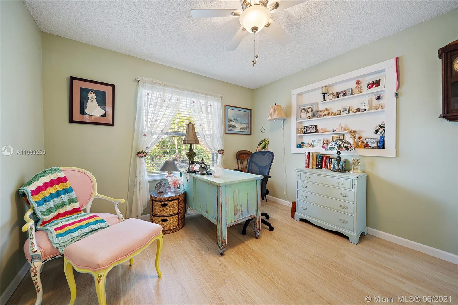 19 Shay Place Tequesta, FL 33469 - Photo 29 of 54 a living room with furniture and a baby crib