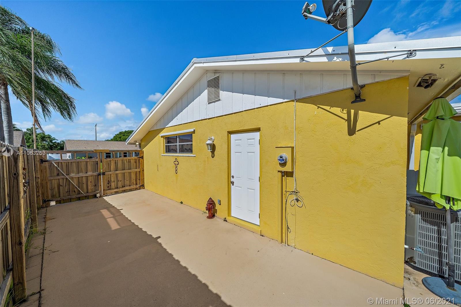 19 Shay Place Tequesta, FL 33469 - Photo 32 of 54 a view of a house with backyard