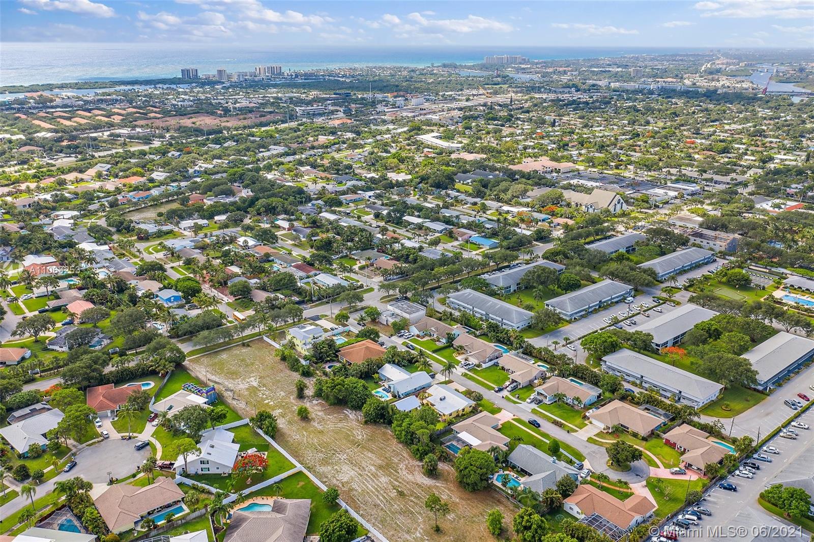19 Shay Place Tequesta, FL 33469 - Photo 49 of 54 an aerial view of residential houses with outdoor space and trees