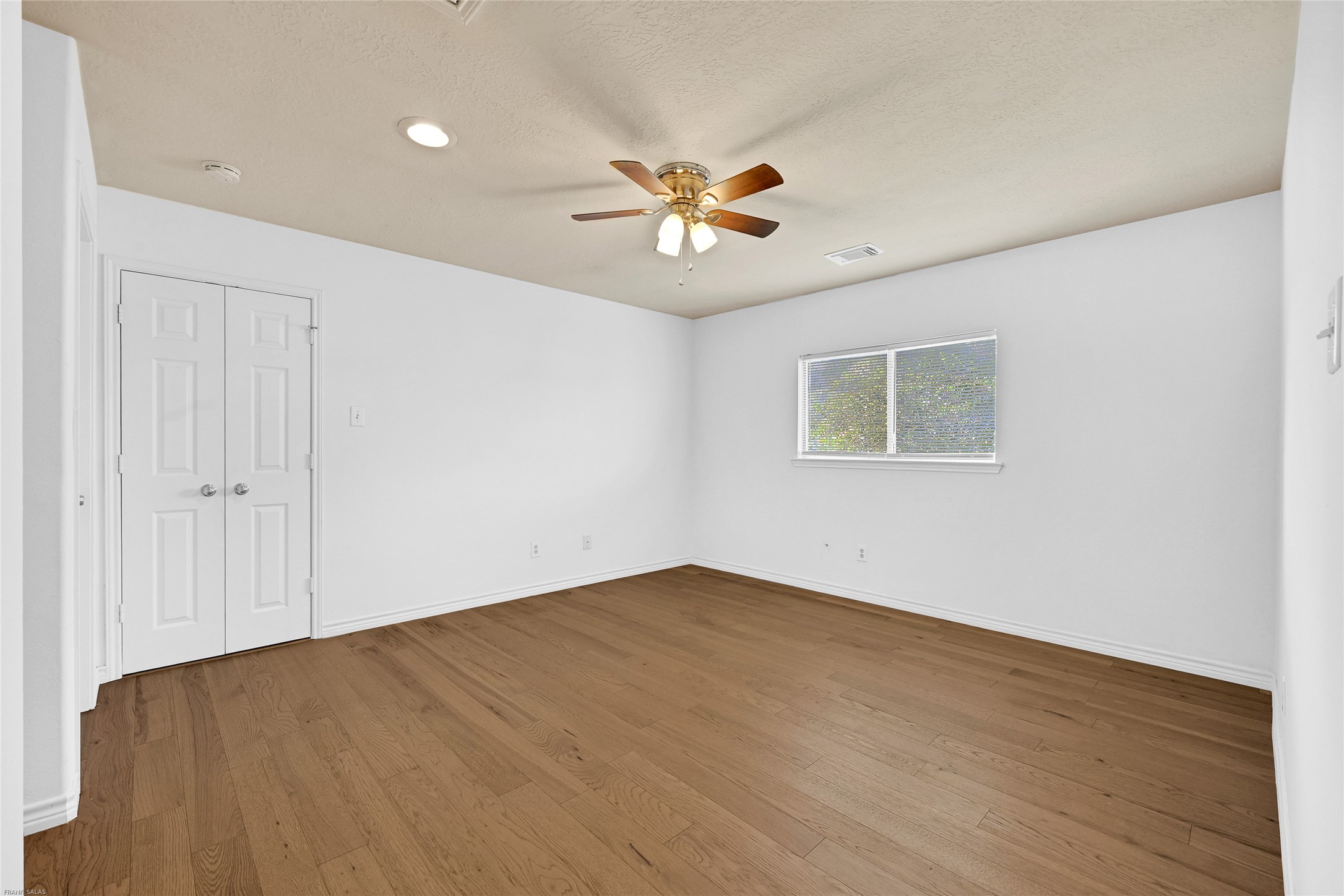 10407 Hamlet Vale Court Houston, TX 77070 - Photo 18 of 24 a view of an empty room with a window