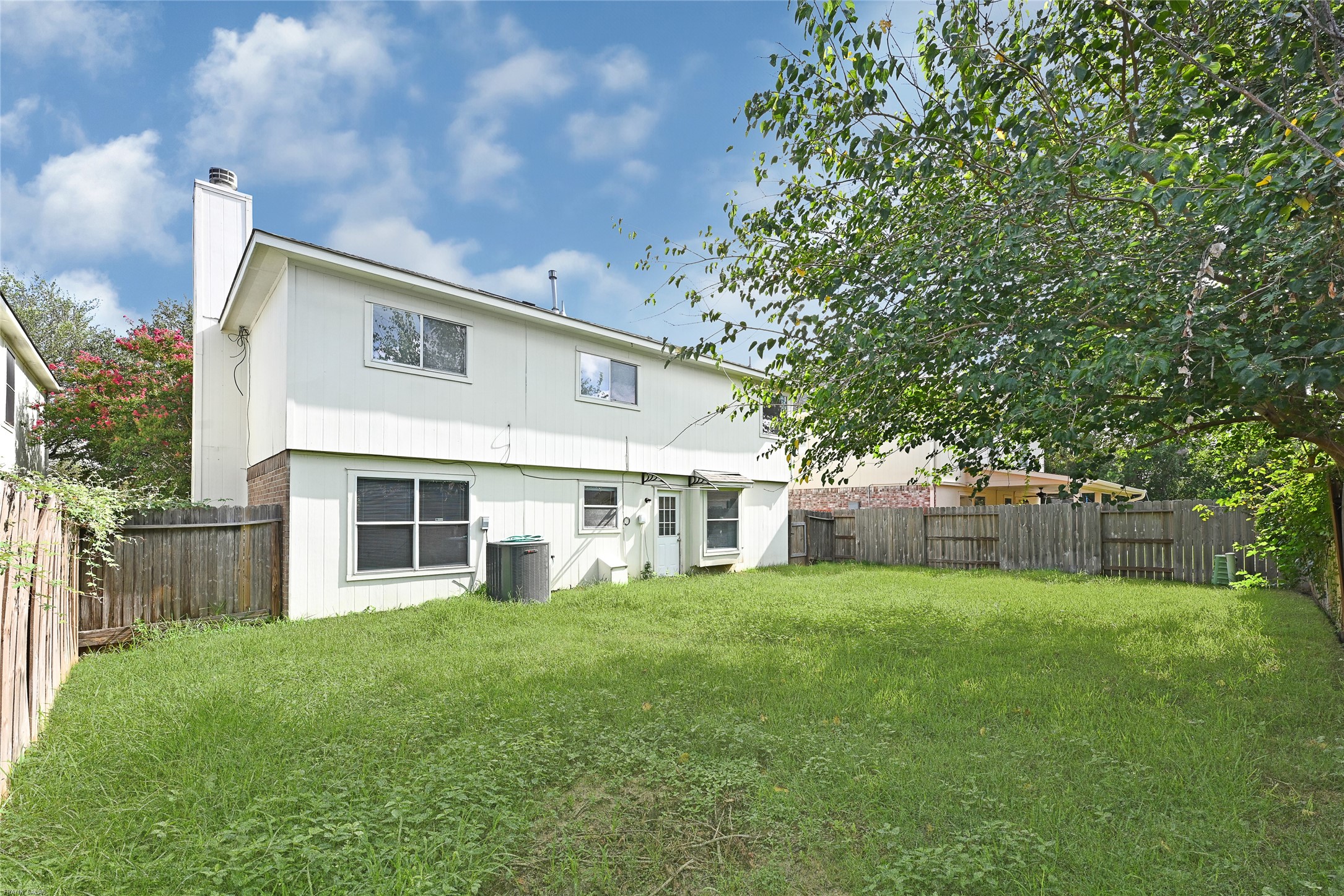 10407 Hamlet Vale Court Houston, TX 77070 - Photo 23 of 24 a house view with a sitting space and garden