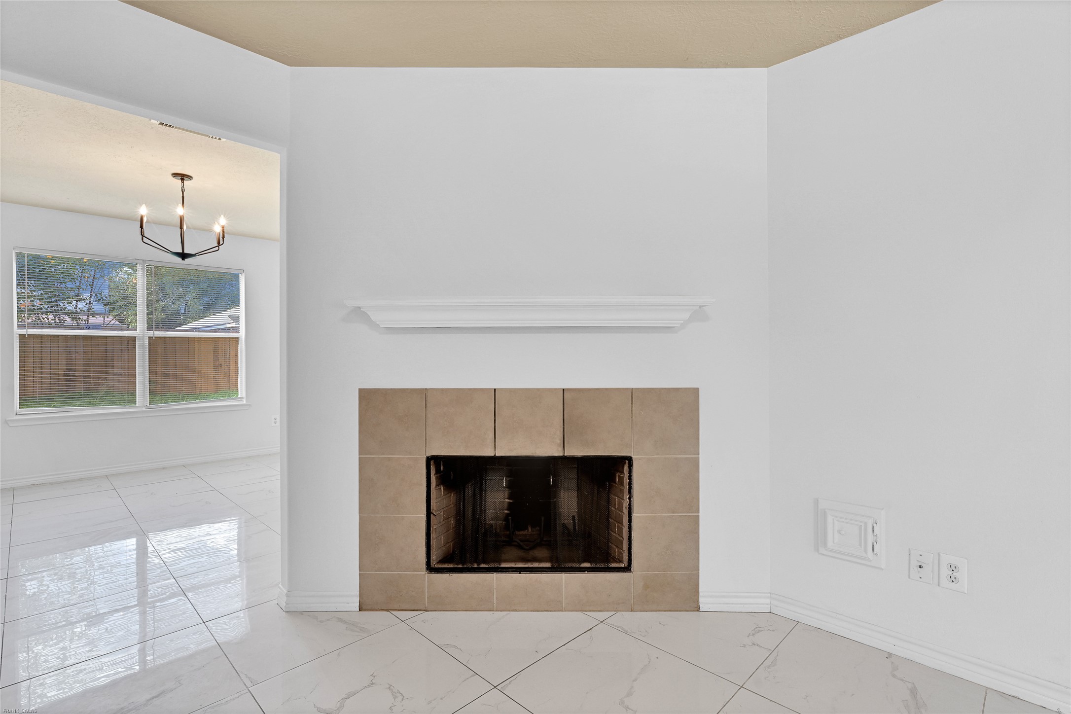 10407 Hamlet Vale Court Houston, TX 77070 - Photo 5 of 24 a living room with a fireplace