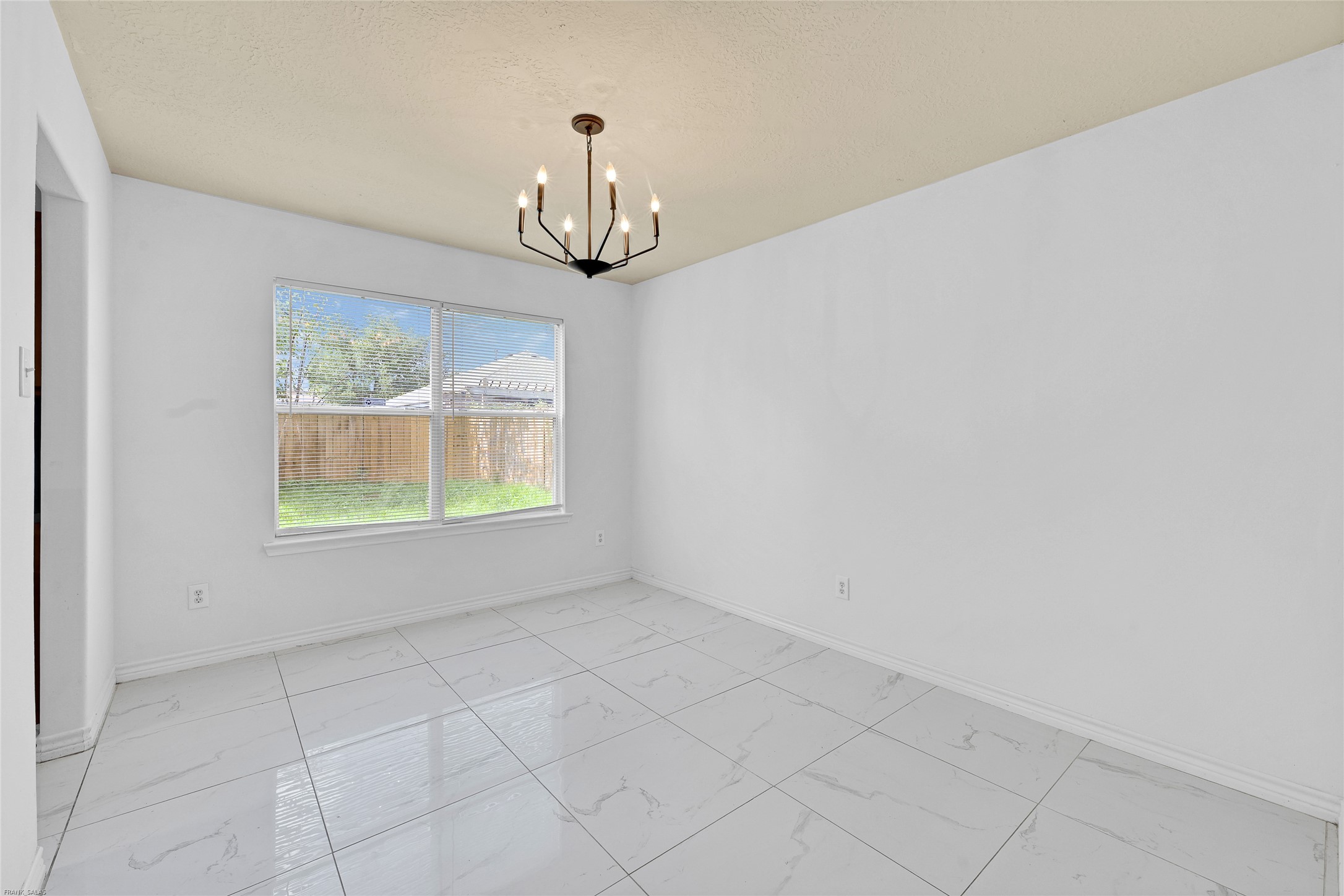 10407 Hamlet Vale Court Houston, TX 77070 - Photo 6 of 24 an empty room with windows