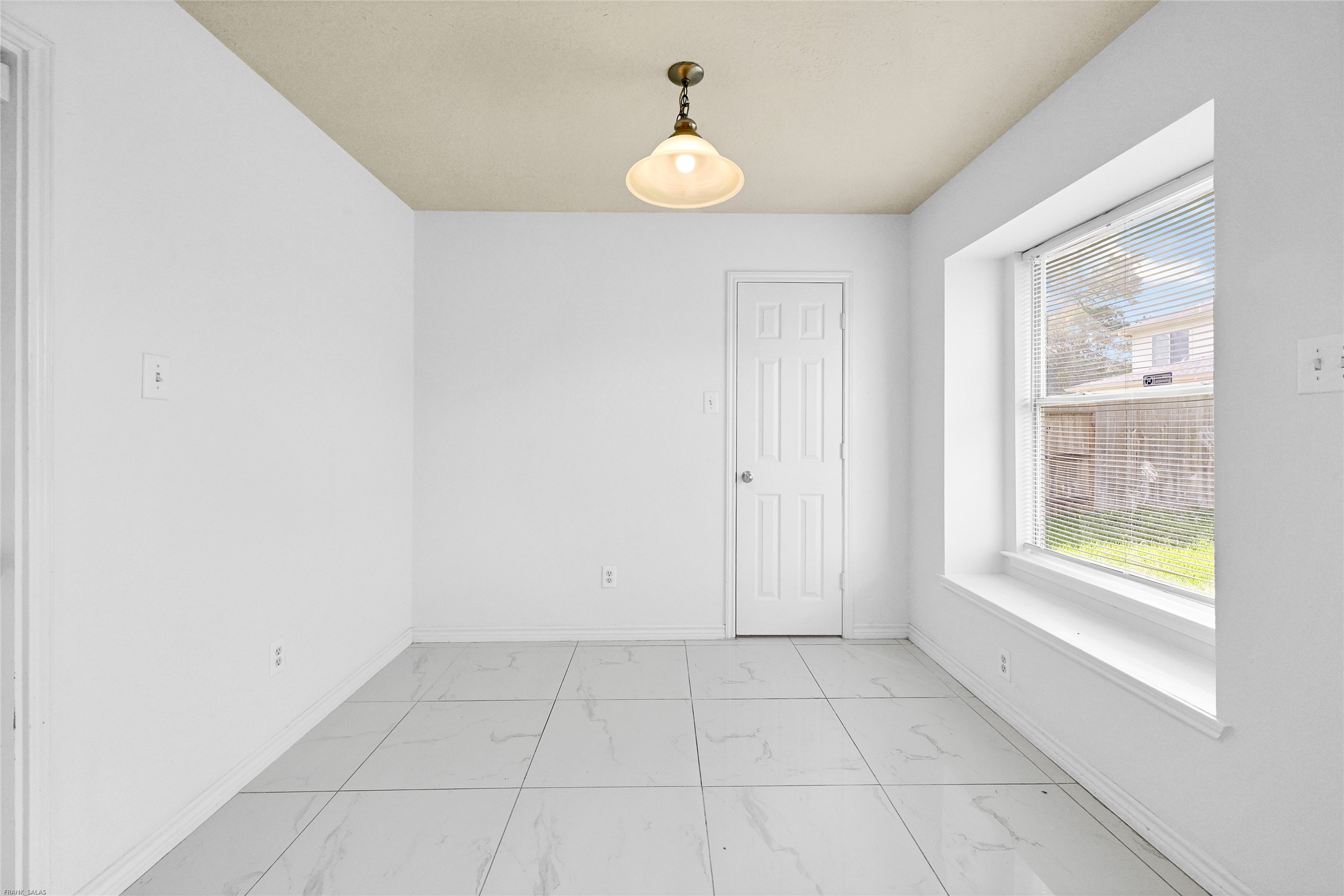 10407 Hamlet Vale Court Houston, TX 77070 - Photo 10 of 24 a view of an empty room with a window