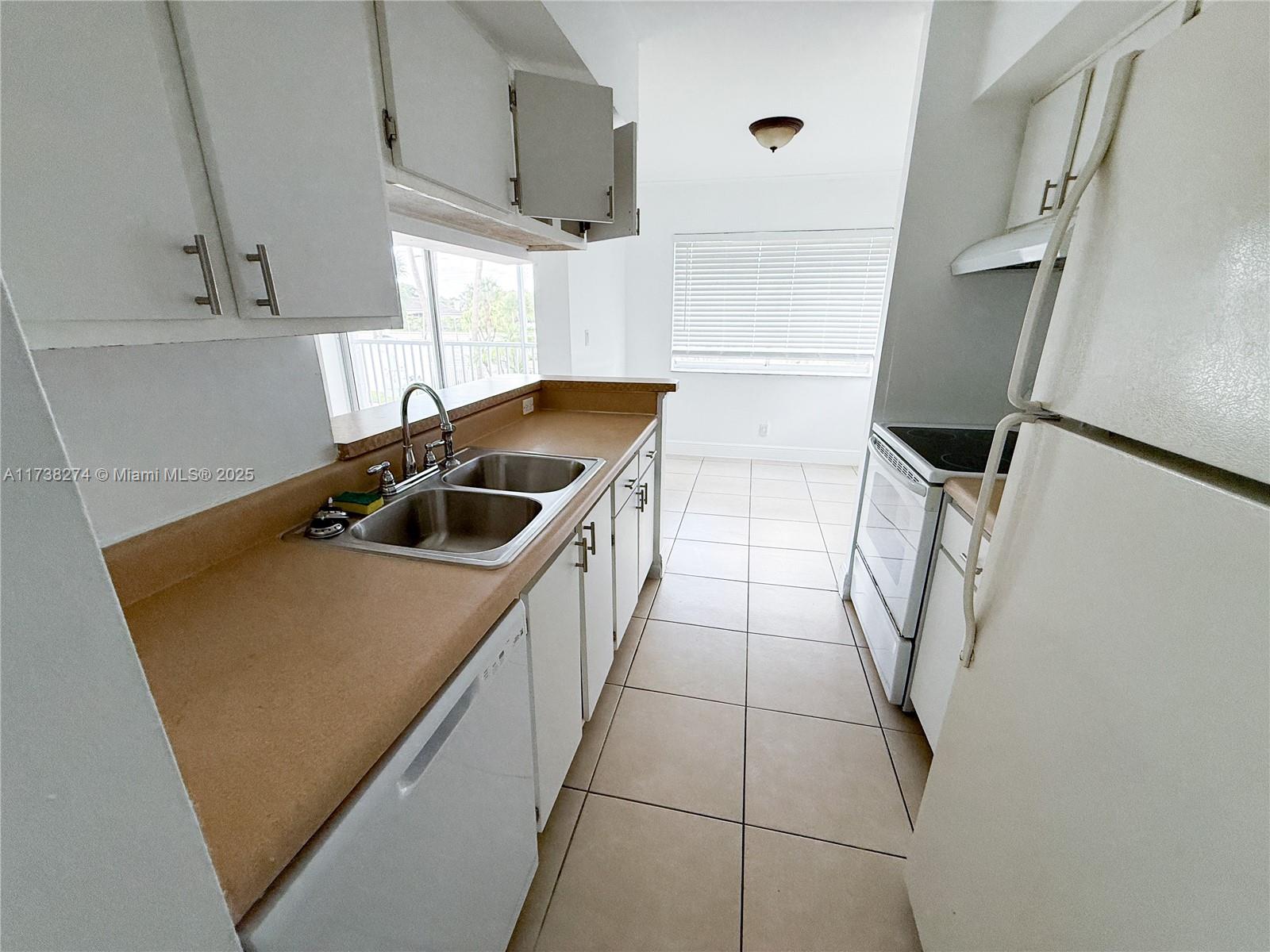 5686 Rock Island Road, Unit 123 Tamarac, FL 33319 - Photo 4 of 25 Gallery Image 4