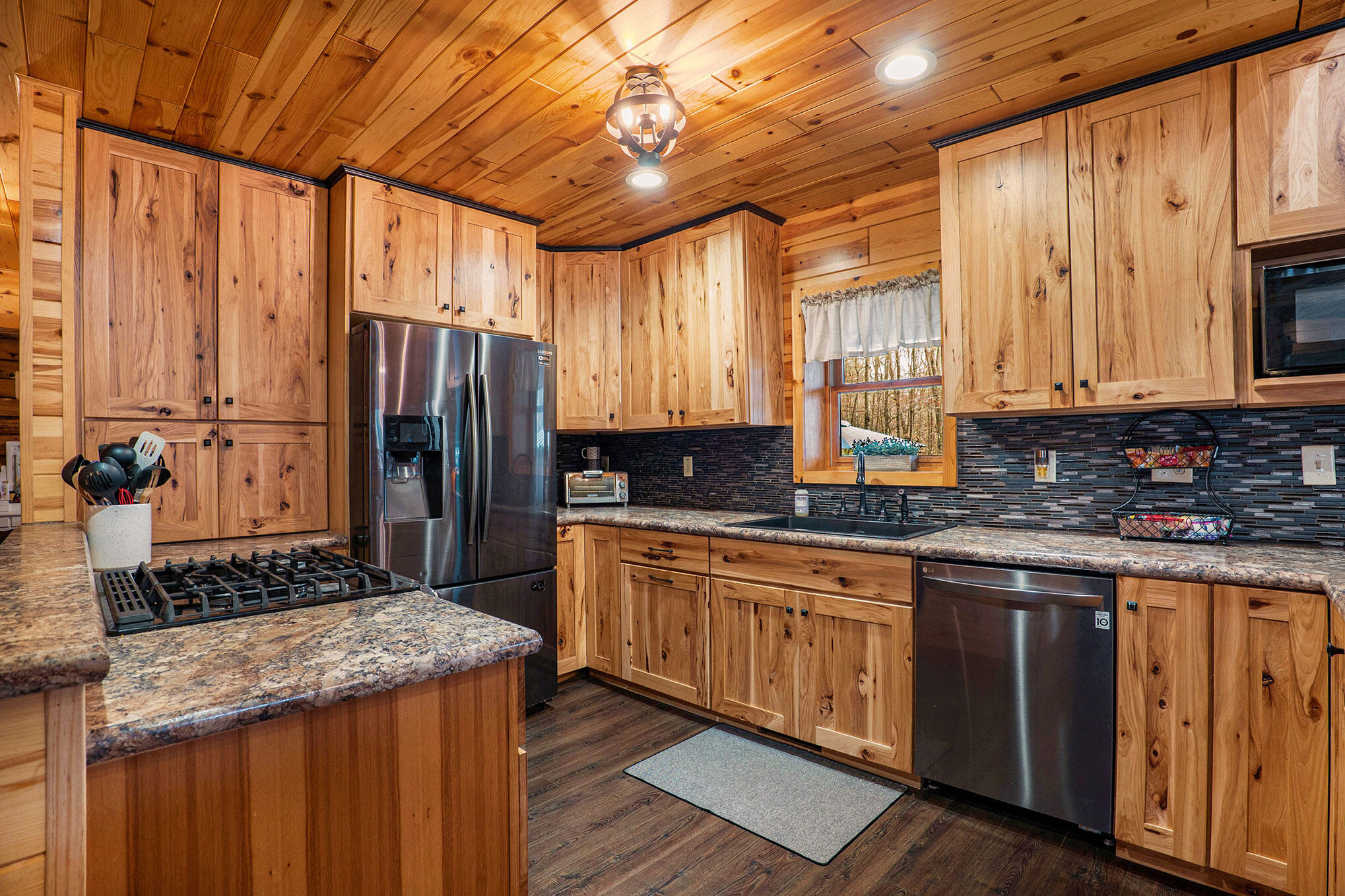 22378 2 Mile Road Morley, MI 49336 - Photo 9 of 26 22375 2 Mile Rd Log Home Clint MAki 616-