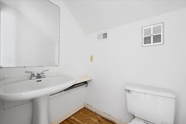 a bathroom with a sink and a toilet