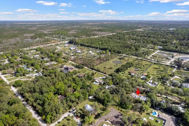 a view of city and green space