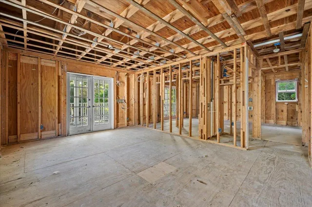 a view of balcony with wooden floor