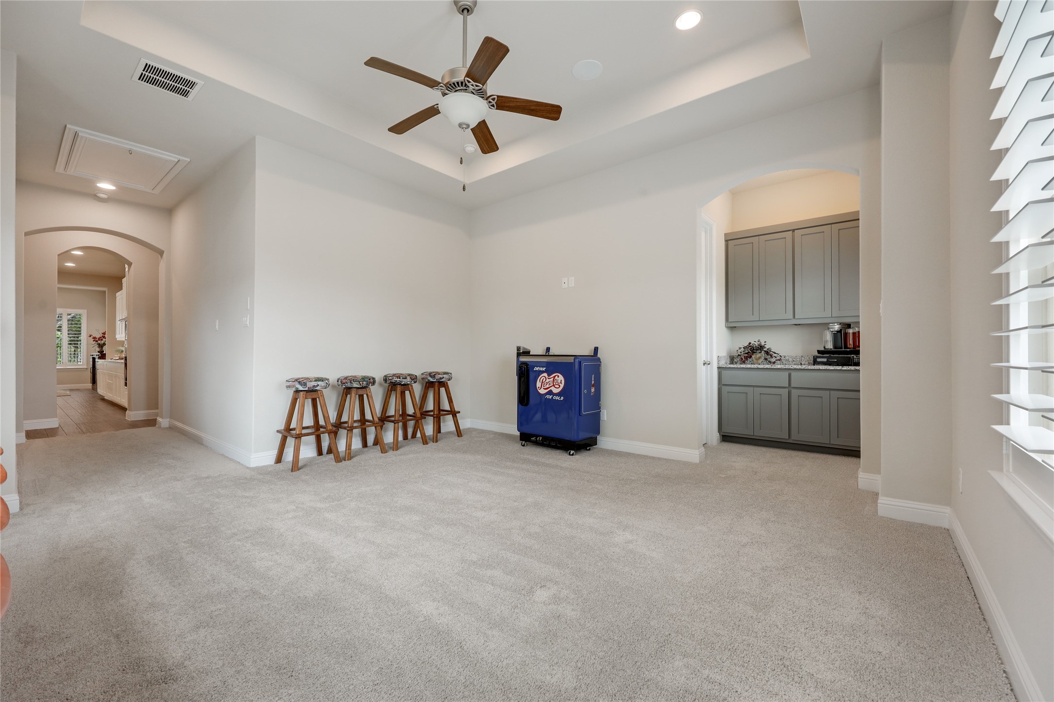 7425 Pace Ravine Drive Lago Vista, TX 78645 - Photo 16 of 40 Bonus room has a dry bar and huge walk in closet.