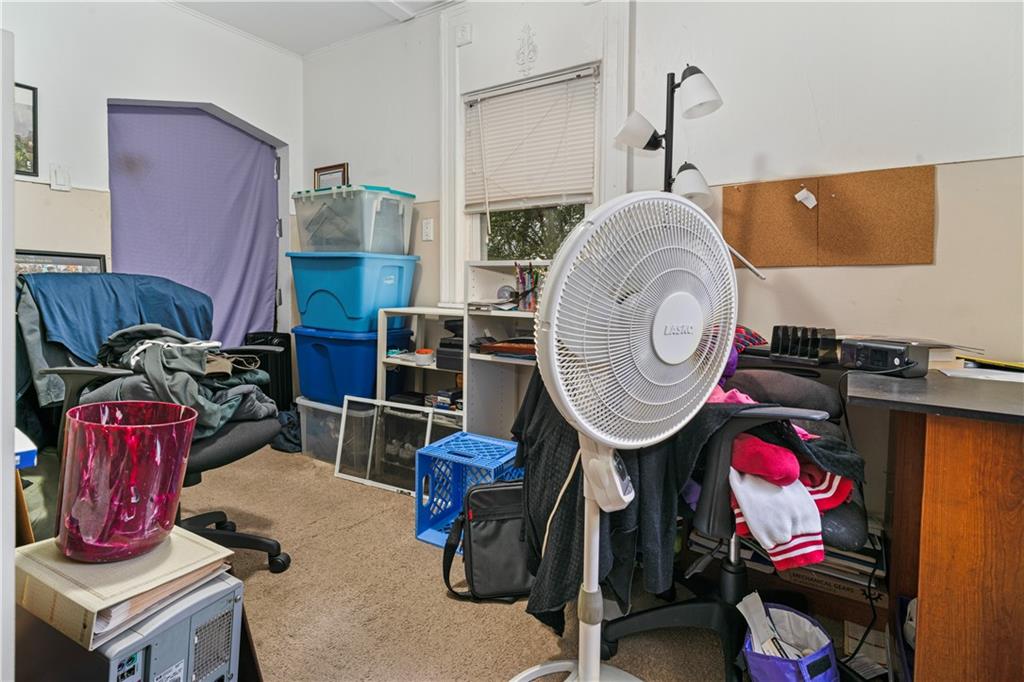 7709 Juniata Street Pittsburgh, PA 15218 - Photo 16 of 22 a room with gym equipment