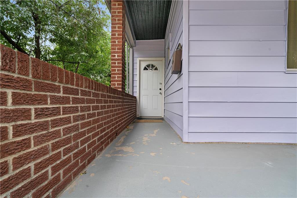 7709 Juniata Street Pittsburgh, PA 15218 - Photo 4 of 22 a view of a balcony with door