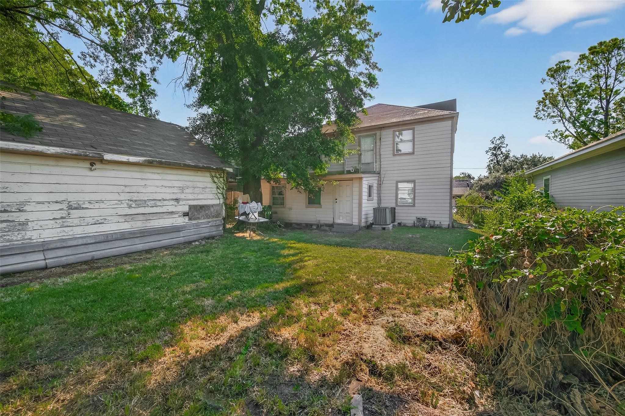 7111 Myrtle Street Houston, TX 77087 - Photo 21 of 24 a view of a house with a yard