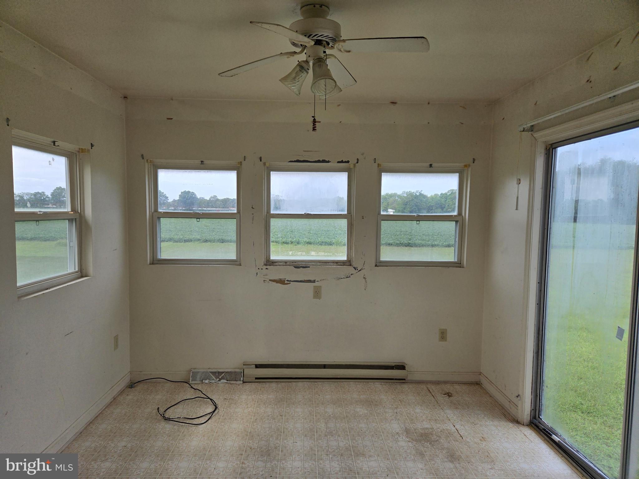8806 Greentop Road Lincoln, DE 19960 - Photo 13 of 35 an empty room with windows