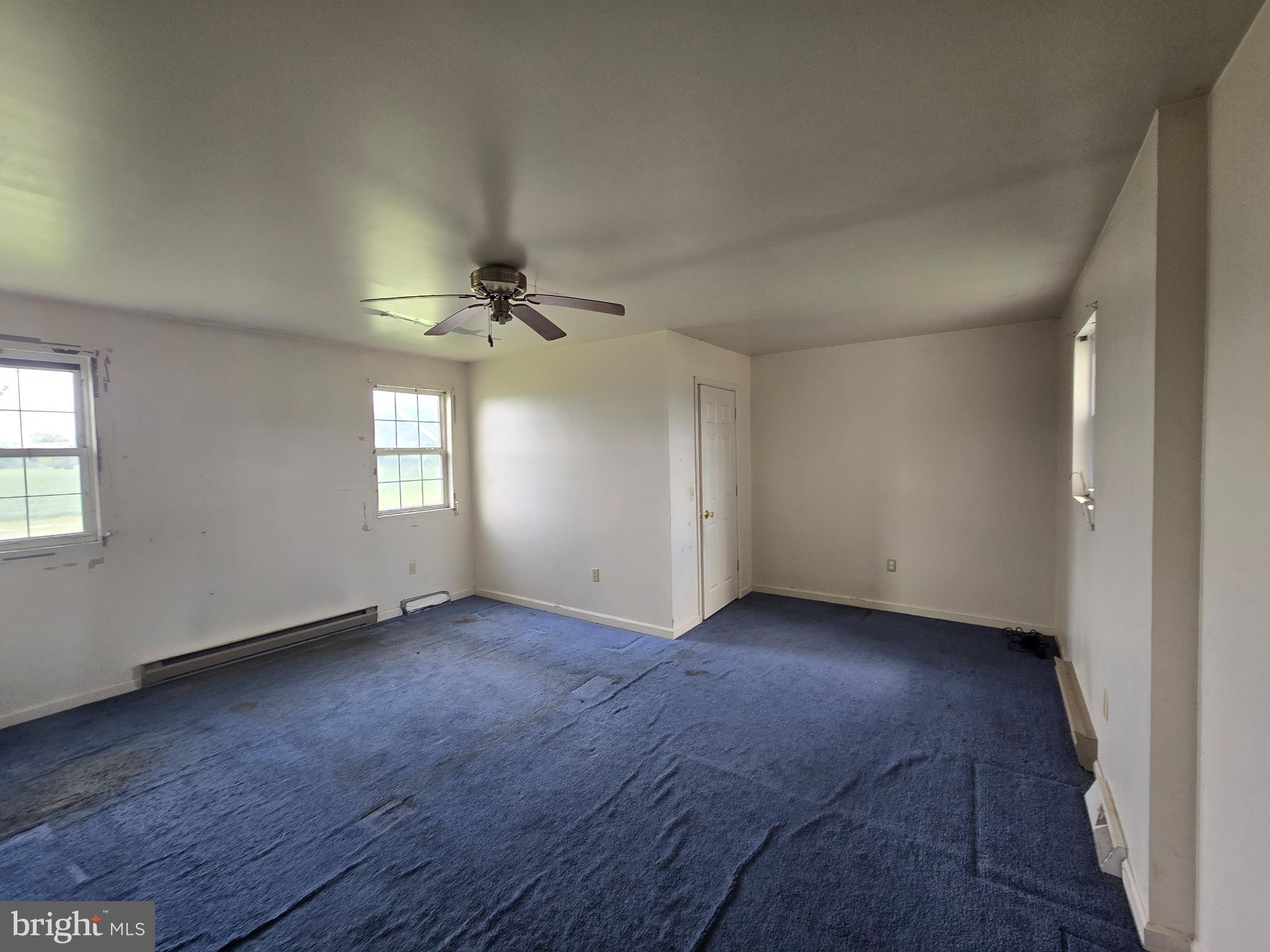 8806 Greentop Road Lincoln, DE 19960 - Photo 18 of 35 an empty room that has a window in it