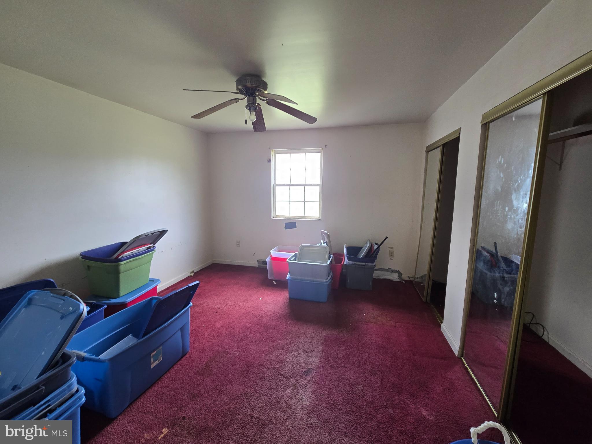 8806 Greentop Road Lincoln, DE 19960 - Photo 19 of 35 a living room with furniture and a window