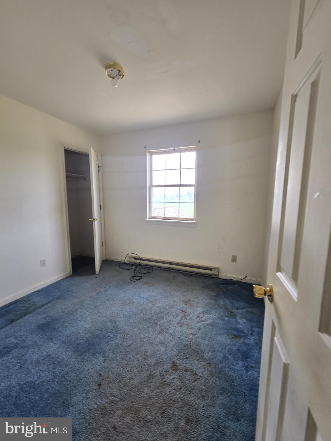 8806 Greentop Road Lincoln, DE 19960 - Photo 23 of 35 an empty room with windows