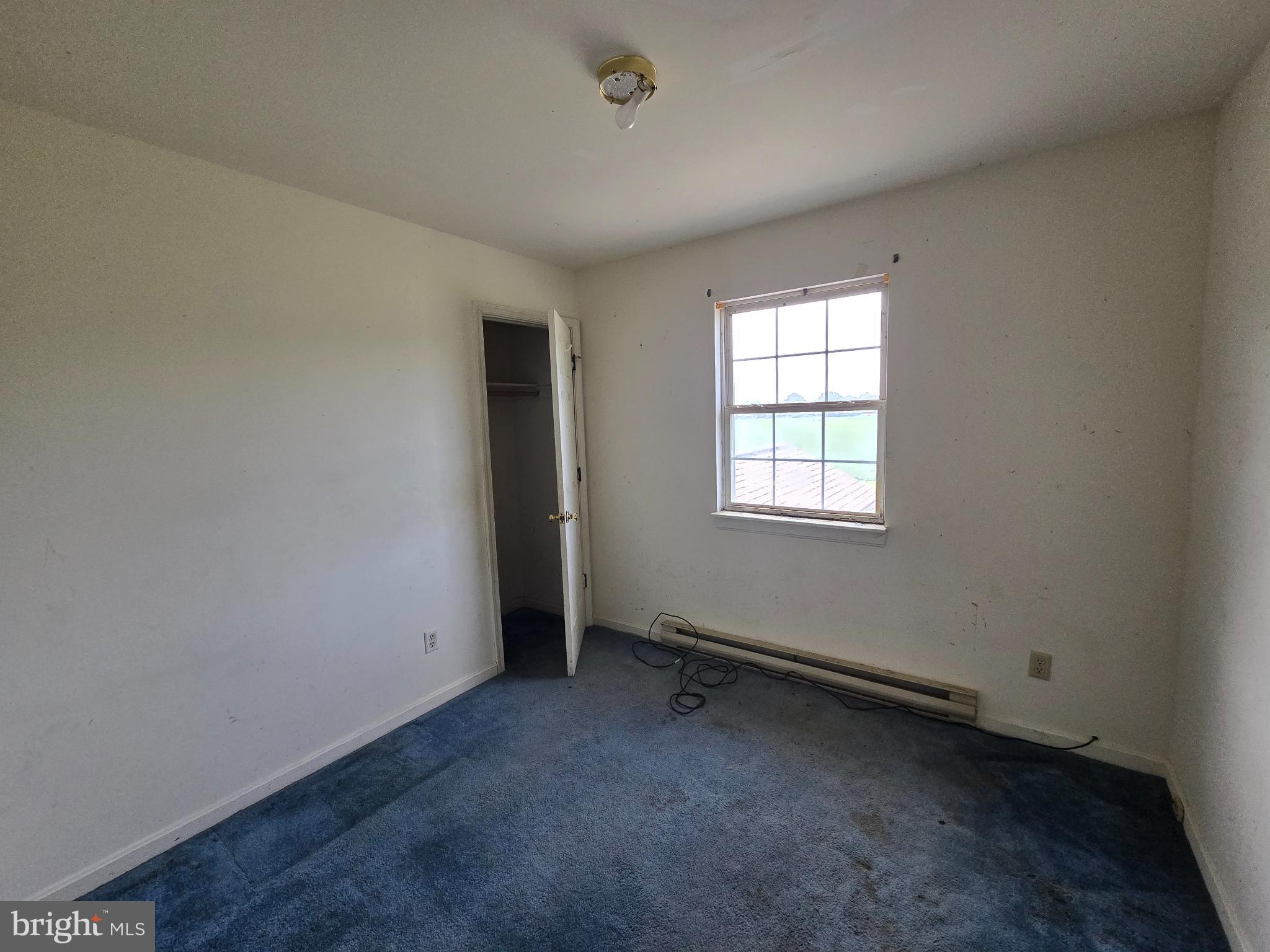 8806 Greentop Road Lincoln, DE 19960 - Photo 24 of 35 an empty room with a window