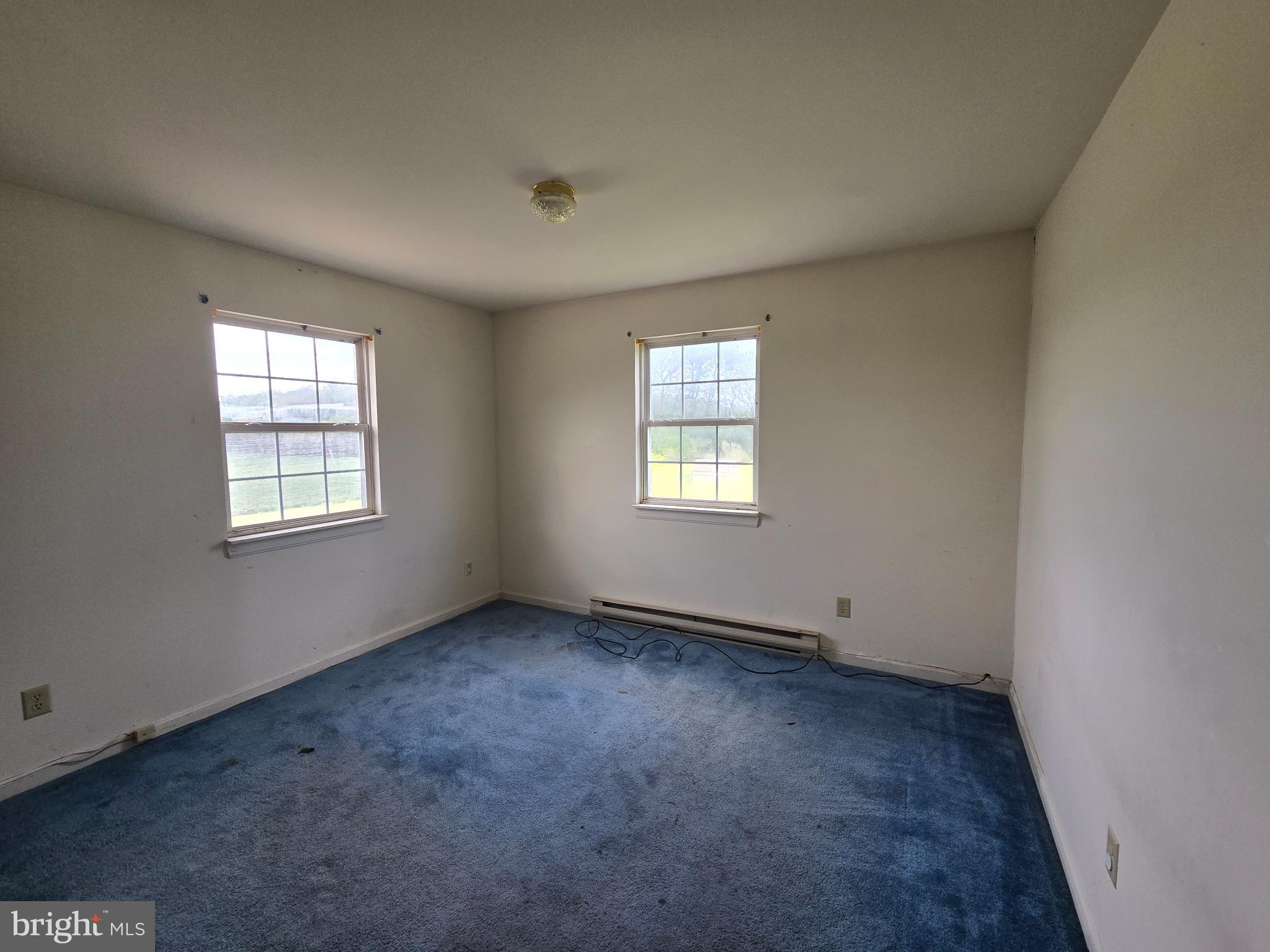 8806 Greentop Road Lincoln, DE 19960 - Photo 25 of 35 an empty room with windows