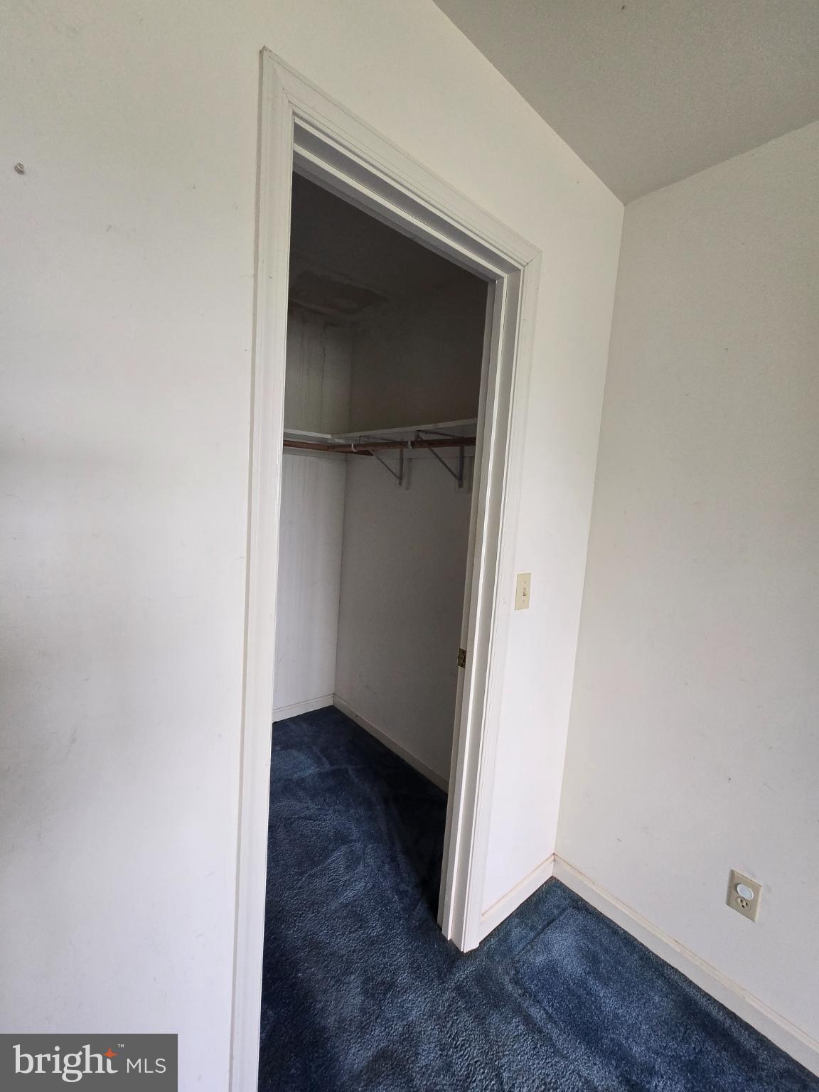 8806 Greentop Road Lincoln, DE 19960 - Photo 31 of 35 an empty room with wooden floor and closet