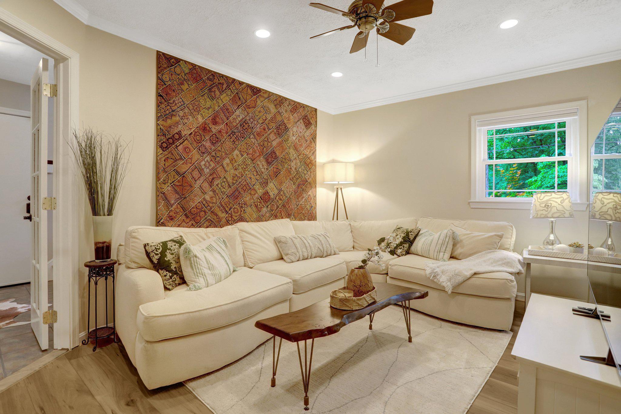 7506 Oriole Avenue Springfield, VA 22150 - Photo 38 of 67 a living room with furniture and a large window
