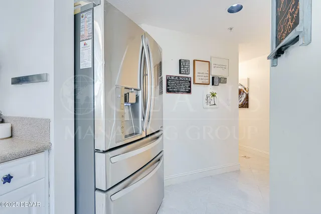 a bathroom with a sink vanity and mirror