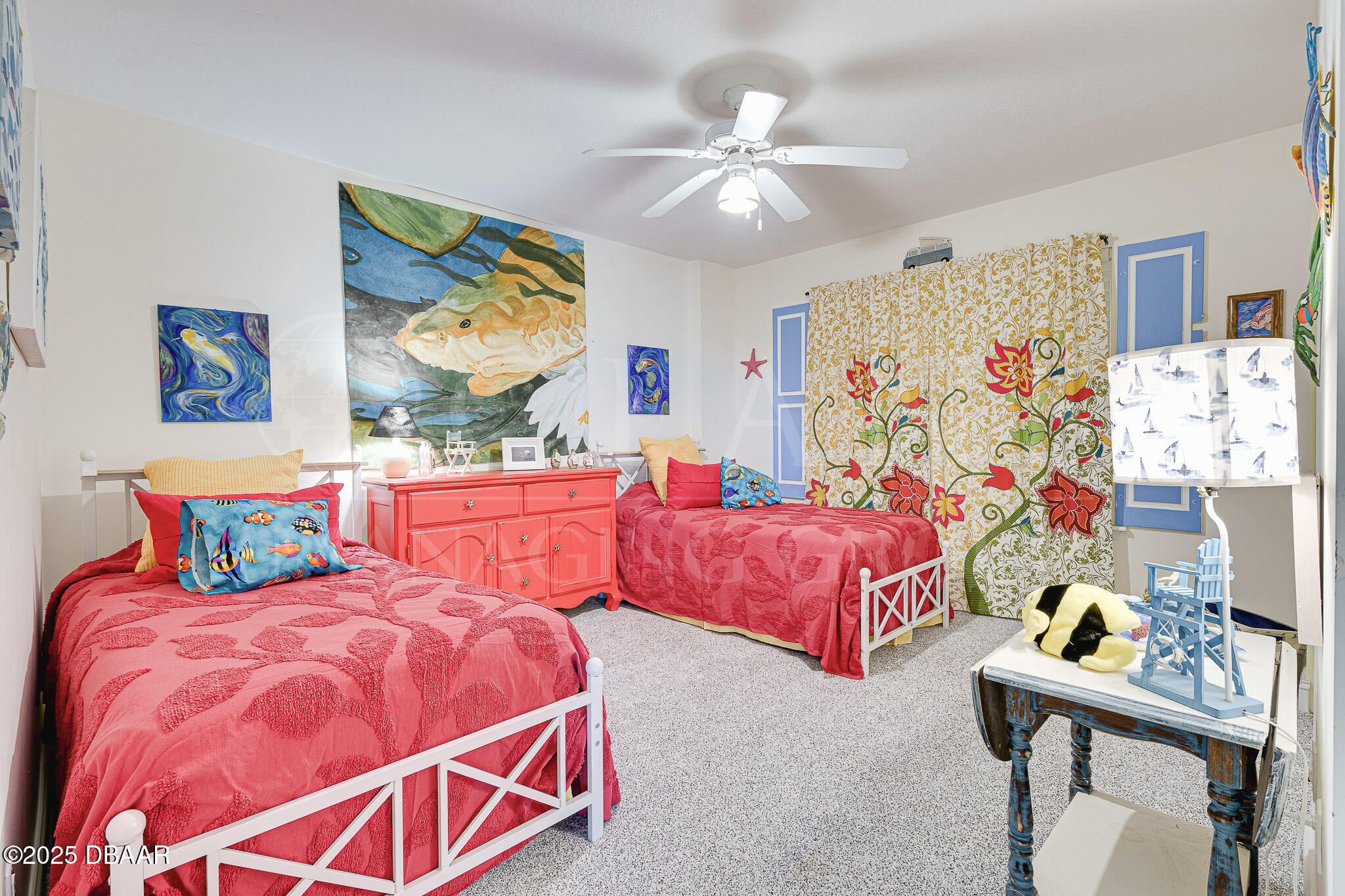 4650 Links Village Drive, Unit C303 Ponce Inlet, FL 32127 - Photo 14 of 67 a bedroom with two beds and painting on the wall