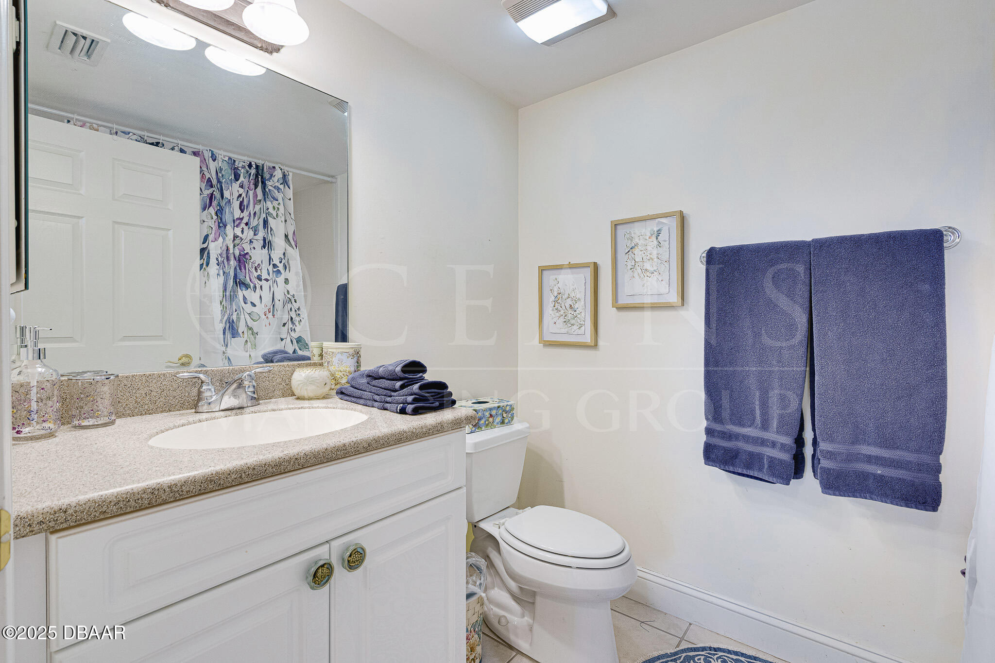 4650 Links Village Drive, Unit C303 Ponce Inlet, FL 32127 - Photo 20 of 67 a bathroom with a sink a toilet and shower