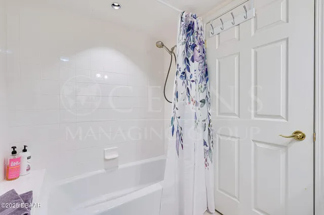 a view of living room with granite countertop furniture and a mirror