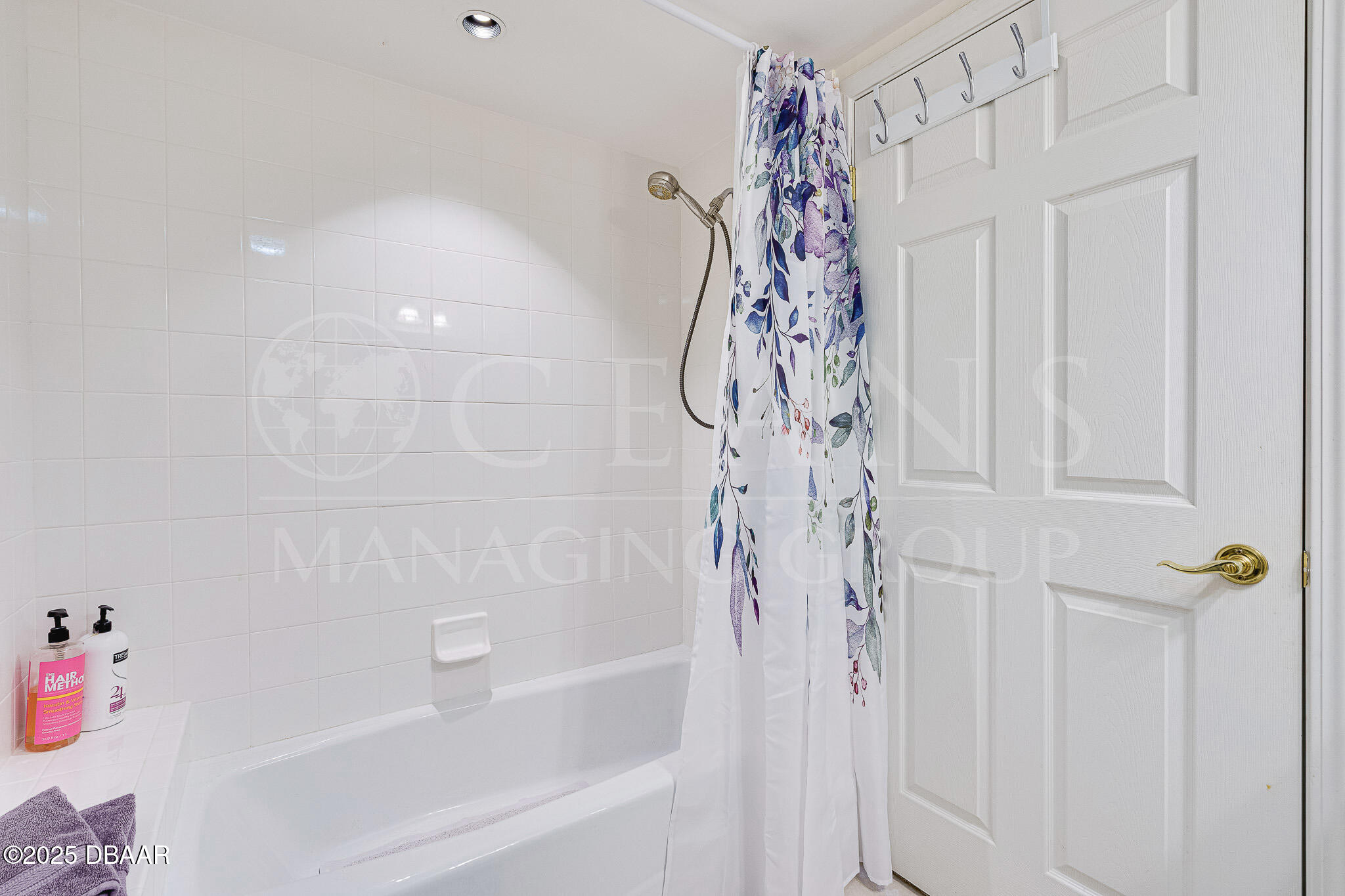 4650 Links Village Drive, Unit C303 Ponce Inlet, FL 32127 - Photo 21 of 67 a bathroom with a bathtub and shower