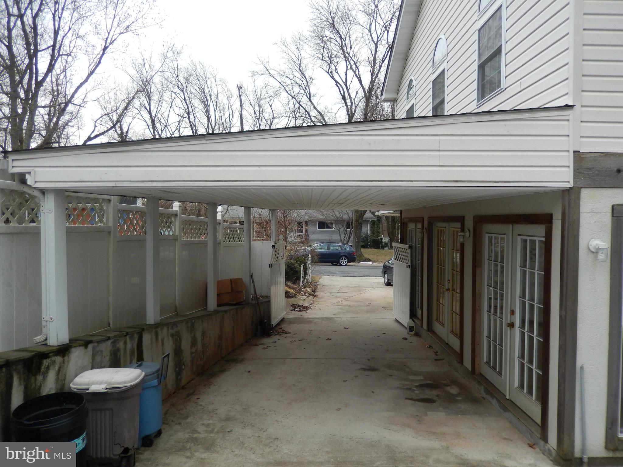 6325 Rockhurst Road Bethesda, MD 20817 - Photo 7 of 30 Exterior Front Left Side Carport Driveway