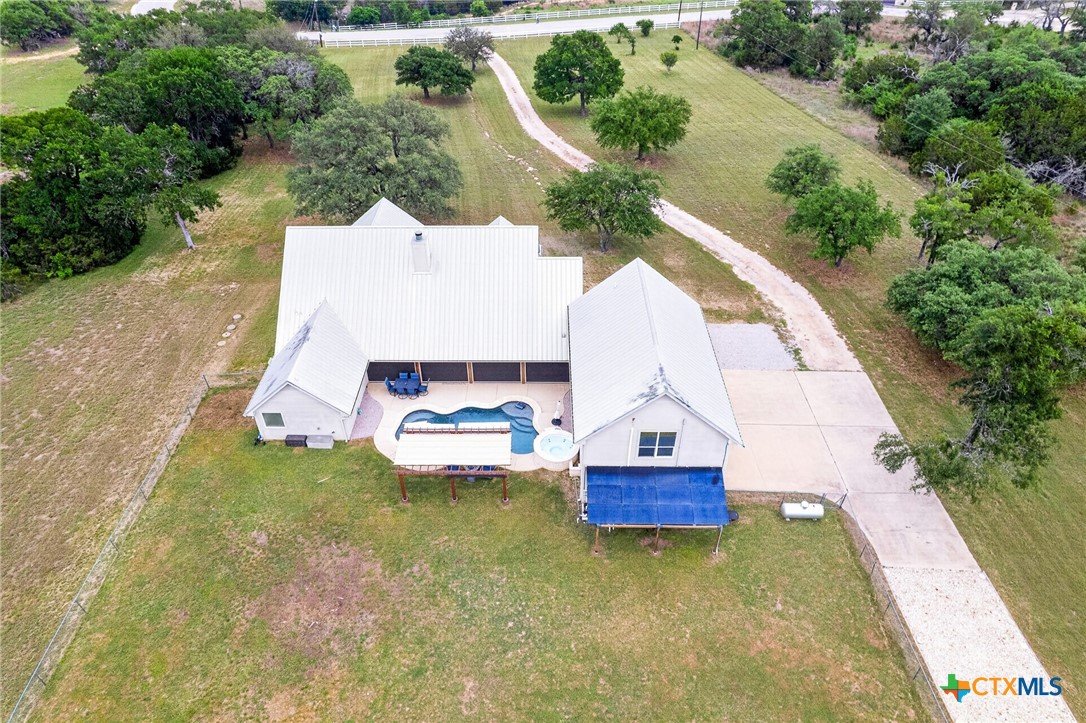 421 Sunset Ridge Drive Killeen, TX 76549 - Photo 7 of 47 an aerial view of a house with a garden and swimming pool