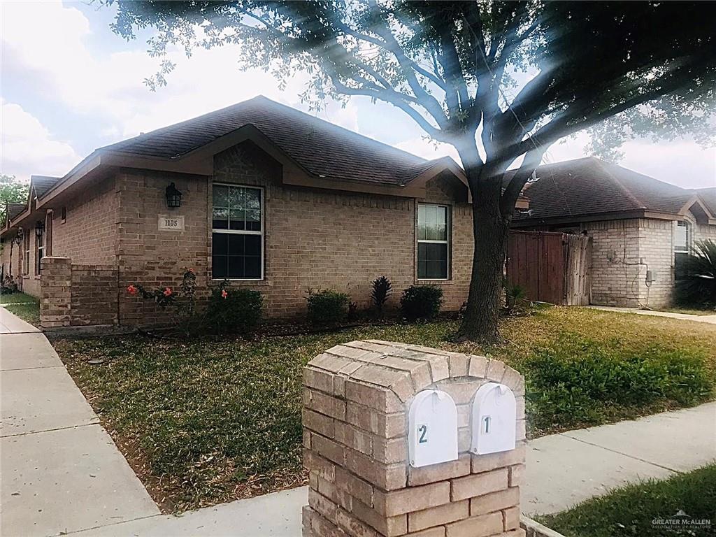 1105 South Palm Drive, Unit 1 Pharr, TX 78577 - Photo 2 of 11 a front view of a house with garden