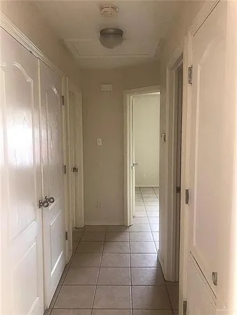a bathroom with a glass door shower