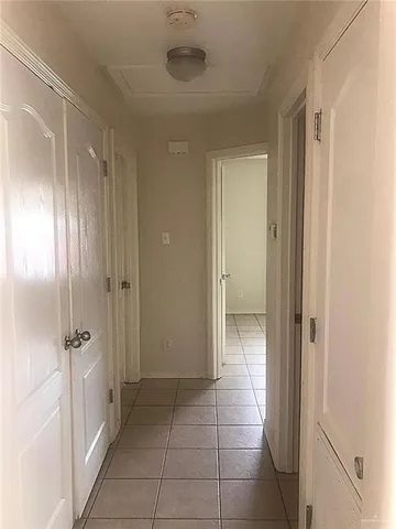 a bathroom with a glass door shower