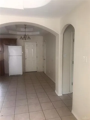 a view of a utility room with closet